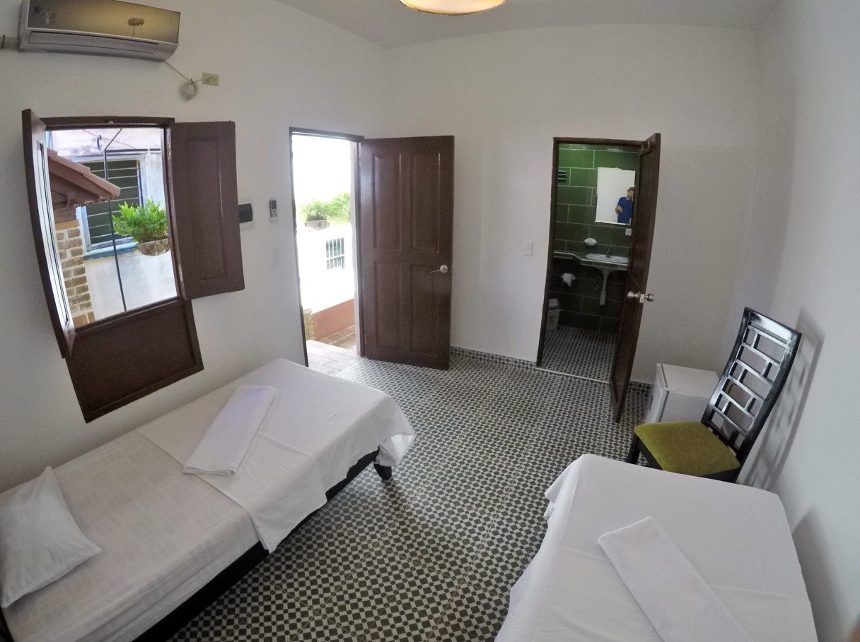 Room 5 with its ensuite bathroom in Casa Obrapia in Old Havana