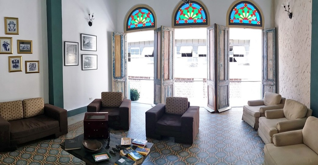 Stained glass arch top antique windows in a private house in Old Havana
