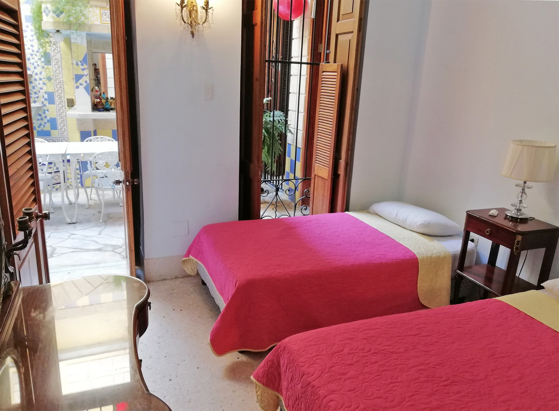 a light filled casa particular room in Havana